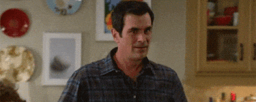 shocked modern family GIF